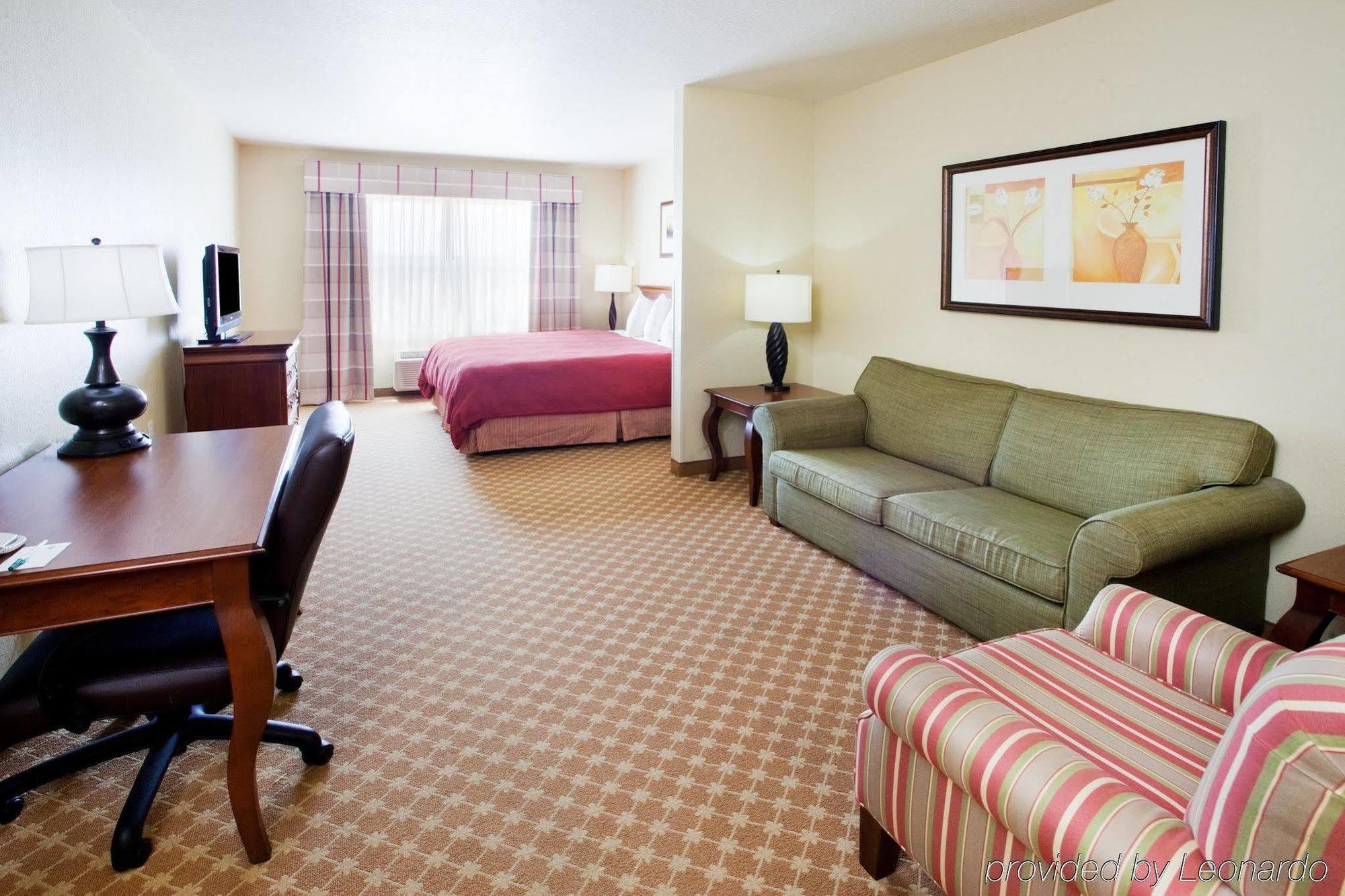 Clarion Pointe Columbus-Bradley Park Hotel Quarto foto